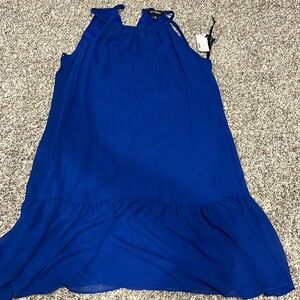 New with tags!! Blue dress with pearl strings on back.